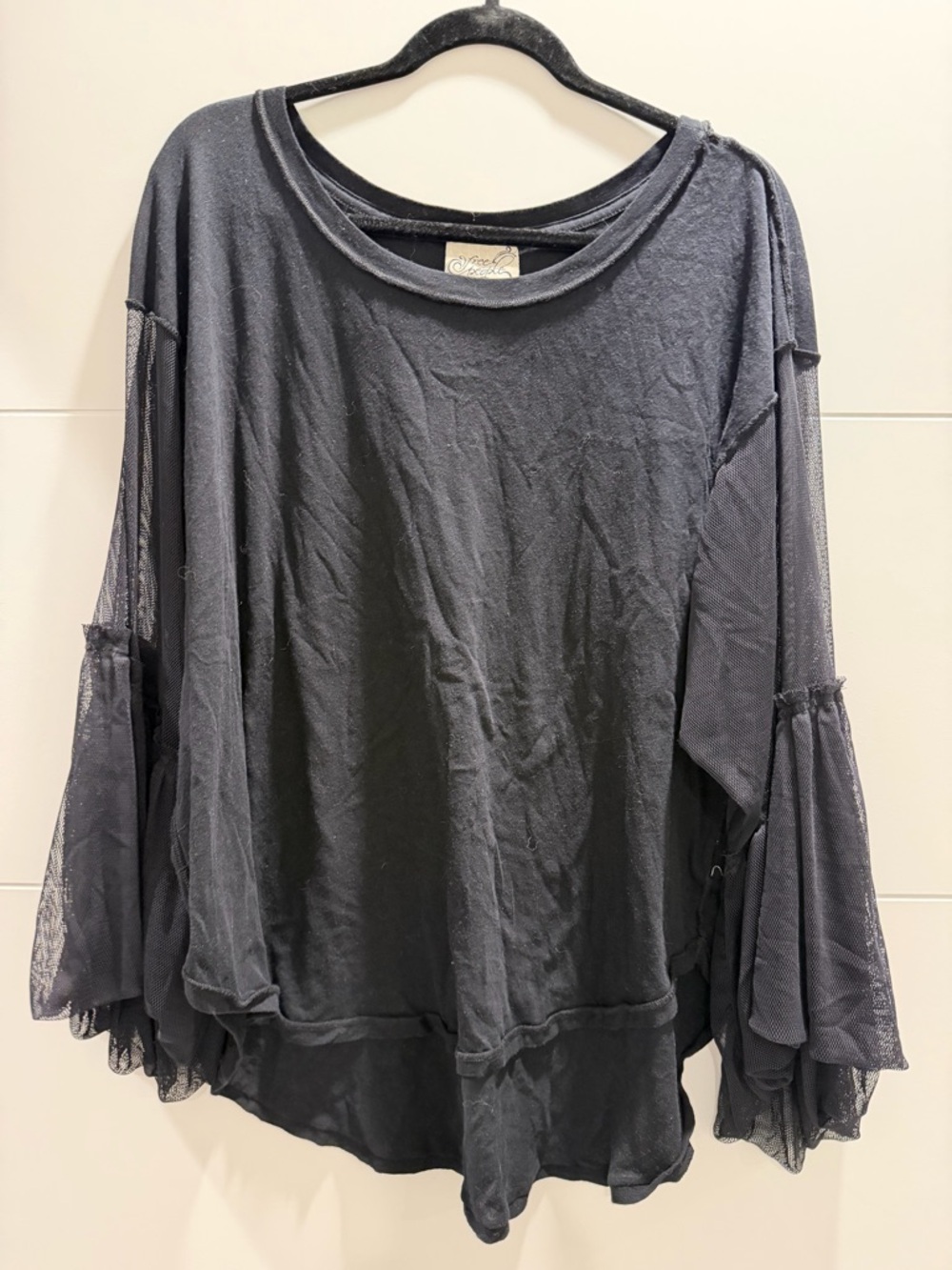 Free people black rounded hem tshirt Medium